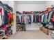 Walk-in closet filled with clothing and shoe storage solutions with organized shelves at 781 Cormiche Ln, Wake Forest, NC 27587