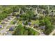 Aerial view of a peaceful residential neighborhood with tree-lined streets at 8016 Parker Mill Trl, Fuquay Varina, NC 27526