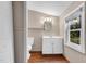 Traditional bathroom with a single sink vanity and a standard toilet at 8175 Nc 27 E, Coats, NC 27521