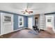 Living room features a wood-burning stove and natural light at 8175 Nc 27 E, Coats, NC 27521