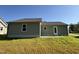 Backyard featuring a grass yard at 86 Heatherglenn Cir, Princeton, NC 27569