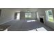 Bright living room featuring a fireplace, and large windows allowing lots of natural light at 86 Heatherglenn Cir, Princeton, NC 27569