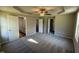 Spacious primary bedroom showing ensuite bathroom and walk-in closet at 86 Heatherglenn Cir, Princeton, NC 27569