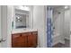 Bathroom with modern sink and vanity plus shower and tub combination at 8812 Forester Ln, Apex, NC 27539
