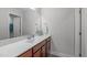 Bathroom with sleek countertop and mirror at 8812 Forester Ln, Apex, NC 27539