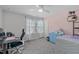 Bright bedroom features plush carpeting, and neutral walls, perfect for relaxation and personalization at 8812 Forester Ln, Apex, NC 27539