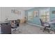 Versatile bedroom filled with natural light is an ideal space for hobbies or work at 8812 Forester Ln, Apex, NC 27539