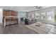 Bright living room showcases an open floor plan, hardwood floors, and eat-in kitchen at 8812 Forester Ln, Apex, NC 27539