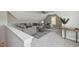 This bonus room features a sitting area with a couch, armchairs and a coffee table at 9220 Yardley Town Dr, Wake Forest, NC 27587