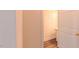Neat half bathroom showcasing sink and a door to the adjacent area at 9531 Vira Dr, Raleigh, NC 27617