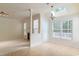 Inviting space with a fireplace, skylight, and tile flooring perfect for relaxation at 9531 Vira Dr, Raleigh, NC 27617