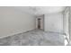 Bedroom featuring tiled floors, closet storage, and glass doors to the exterior at 1005 Greenwood Cir, Cary, NC 27511