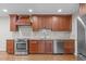 Beautiful kitchen showcasing stainless steel appliances, granite countertops, and custom cabinetry at 1005 Greenwood Cir, Cary, NC 27511