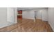 Open-concept living room with seamless transition to a well-equipped kitchen and comfortable living spaces at 1005 Greenwood Cir, Cary, NC 27511