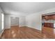 Open concept living space showcasing hardwood floors, natural light, and access to the kitchen at 1005 Greenwood Cir, Cary, NC 27511