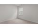 Well-lit bedroom with carpet, and a window that lets in plenty of natural light at 1014 Middlecrest Dr, Rocky Mount, NC 27804