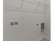 Clean laundry room with gray tile floors, a wire shelf, and washer/dryer hookups at 1014 Middlecrest Dr, Rocky Mount, NC 27804