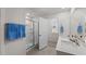 Clean and bright bathroom featuring double sinks, a glass shower, and modern fixtures at 1017 Middlecrest Dr, Rocky Mount, NC 27804