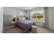 Bright bedroom features a large window, neutral color palette, and stylish furniture at 1017 Middlecrest Dr, Rocky Mount, NC 27804