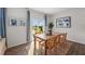 Sunlit dining room with a large window and stylish decor, perfect for Gathering gatherings and entertaining at 1017 Middlecrest Dr, Rocky Mount, NC 27804