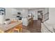 Well-lit kitchen with stainless steel appliances, a central island with bar stools, and open access to the dining area at 1017 Middlecrest Dr, Rocky Mount, NC 27804