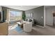 Bright living room with large window, comfortable seating, and modern decor for a welcoming space at 1017 Middlecrest Dr, Rocky Mount, NC 27804