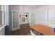 Bright office space with hardwood floors, complemented by elegant French doors and stylish decor at 1017 Middlecrest Dr, Rocky Mount, NC 27804