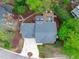 Aerial view of the property showing well-maintained landscaping and a backyard deck at 102 Parkbranch Ln, Cary, NC 27519