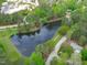 Aerial view of neighborhood pond at 102 Parkbranch Ln, Cary, NC 27519