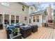 Home exterior featuring back deck with ample outdoor seating and natural gas heater at 102 Parkbranch Ln, Cary, NC 27519