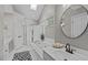 Bright bathroom with a soaking tub, a separate shower, and a vanity at 102 Parkbranch Ln, Cary, NC 27519