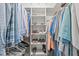 Organized walk-in closet featuring ample storage with shelves, hanging racks, and organized clothing at 102 Parkbranch Ln, Cary, NC 27519
