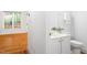 Bright bathroom featuring a white vanity, toilet, and neutral wall colors for a clean, modern look at 103 Caymus Ct, Cary, NC 27519