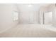 Large main bedroom with neutral carpet, a ceiling fan, and a bright window at 103 Caymus Ct, Cary, NC 27519