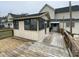 Back porch with a deck and screened-in area, offering a perfect spot for outdoor relaxation at 104 N 16Th St, Erwin, NC 28339