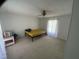 Bright bedroom with a neutral color palette, ceiling fan, and carpeted flooring, creating a calm, relaxing space at 104 N 16Th St, Erwin, NC 28339