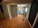 Living room with wood floors, open layout, and natural light, ready for personalization and comfortable living at 104 N 16Th St, Erwin, NC 28339