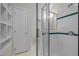 The bathroom features tile-lined shower with glass doors and built-in shelves at 105 Toynbee Pl, Chapel Hill, NC 27514