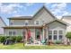 Exterior elevation showcasing the home's backyard with patio area, grill and landscaping at 1109 Forest Willow Ln, Morrisville, NC 27560
