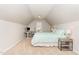 Cozy bedroom with neutral carpet, a comfortable bed and a work area by the window at 1109 Forest Willow Ln, Morrisville, NC 27560