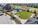 Aerial view of community playground with slides, a picnic table and seating at 1126 Russet Ln, Apex, NC 27523