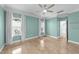 Spacious bedroom offering natural light and a modern ceiling fan at 1126 Russet Ln, Apex, NC 27523