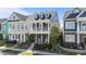 Two-story home featuring a welcoming front porch and upper level balcony at 1126 Russet Ln, Apex, NC 27523