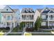 Charming two-story home with double porches, white columns, and well-maintained landscaping at 1126 Russet Ln, Apex, NC 27523