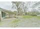 Spacious backyard includes patio area and plenty of room for outdoor activities at 116 Crawford Rd, Hillsborough, NC 27278
