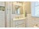 Bathroom featuring a white vanity, subway tile, and modern fixtures at 116 Crawford Rd, Hillsborough, NC 27278