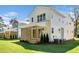 Beautiful backyard with a covered patio and sliding glass doors, perfect for outdoor living at 1207 Chaney Rd, Raleigh, NC 27606