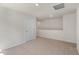 Upstairs loft area with neutral carpet and recessed lighting at 125 Pisgah St, Sanford, NC 27330