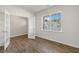 Bright room featuring french doors and a large window with lovely neighborhood views at 125 Pisgah St, Sanford, NC 27330