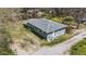 Aerial view of home with a large backyard, driveway, and mature trees at 13832 Nc 96 N Hwy, Zebulon, NC 27597